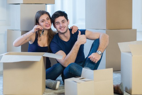 Removal van and moving team prepared for a home move in Queensbury