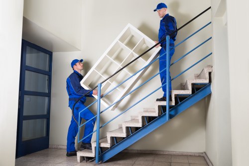 Local furniture haul away service navigating stairs and tight access in Queensbury