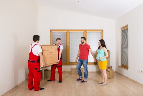 Van loading furniture for a move in Queensbury