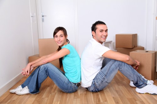 Local house removalists loading household items for transport