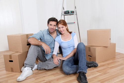 Packed office equipment ready for a commercial move in Queensbury