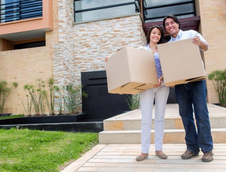 Household furniture and boxes prepared for a man with van move in Queensbury
